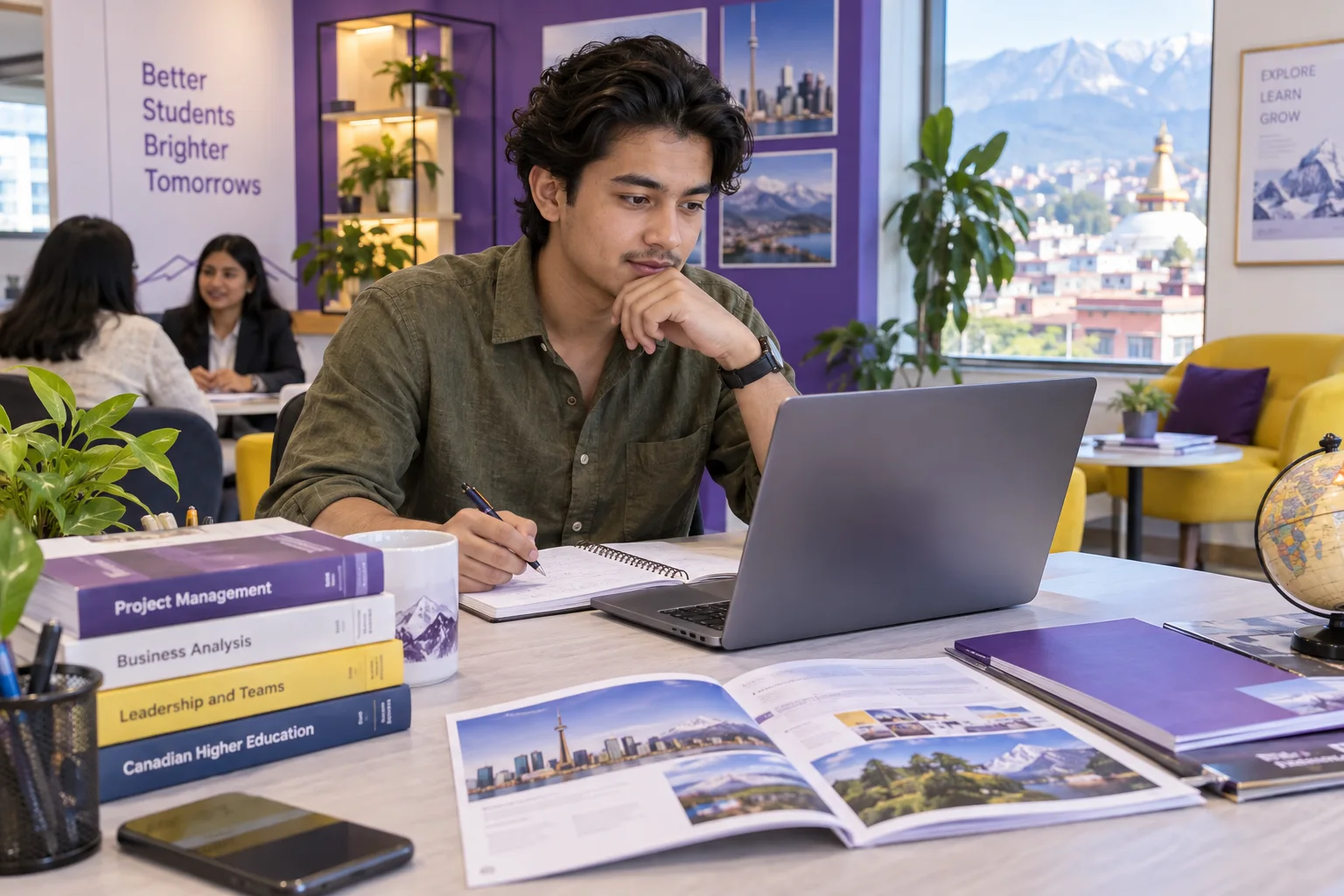 Young Nepali man with swept-back hair comparing Canadian university courses and intake options using a laptop and notebook for Canada study planning