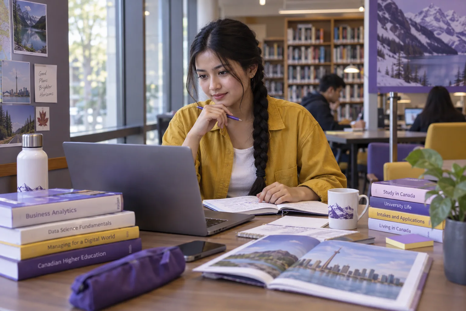 Young Nepali woman with a long braid comparing Canadian university courses and intake options using a laptop and notebook for Canada study planning