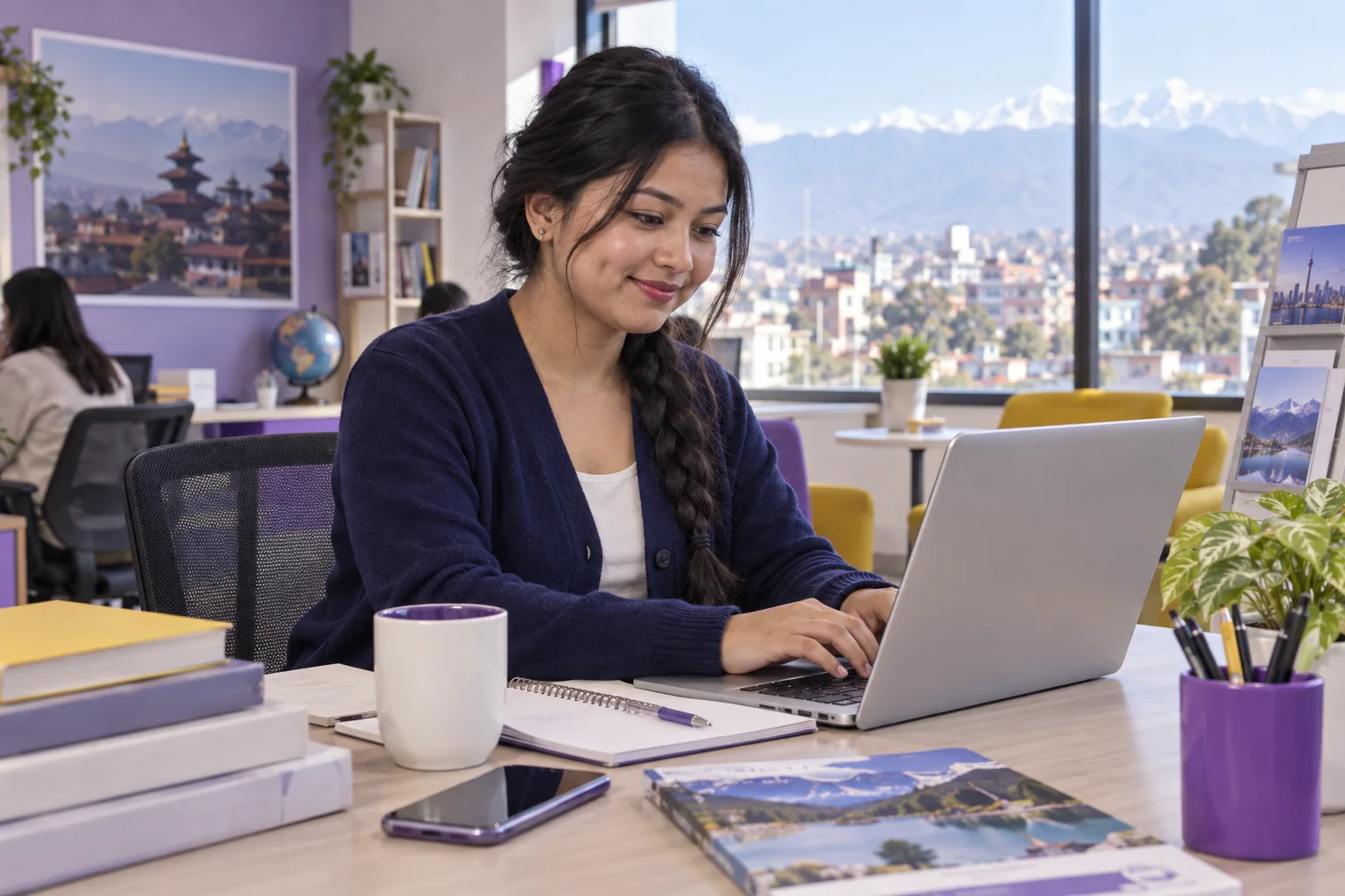 Young Nepali woman with a long braid comparing Canadian university courses and intake options using a laptop and notebook for Canada study planning