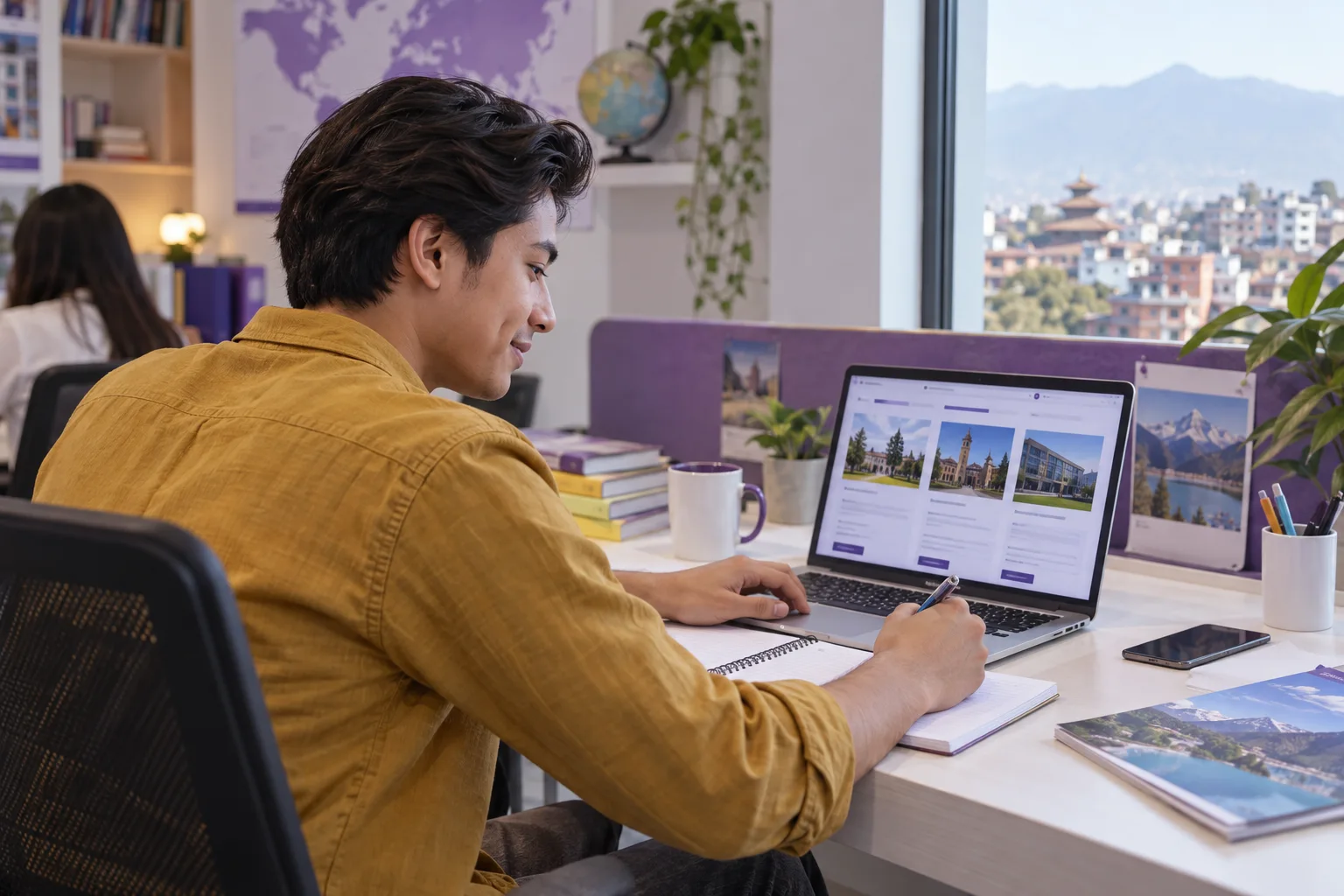 Young Nepali man with swept-back hair comparing Canadian university courses and intake options using a laptop and notebook for Canada study planning