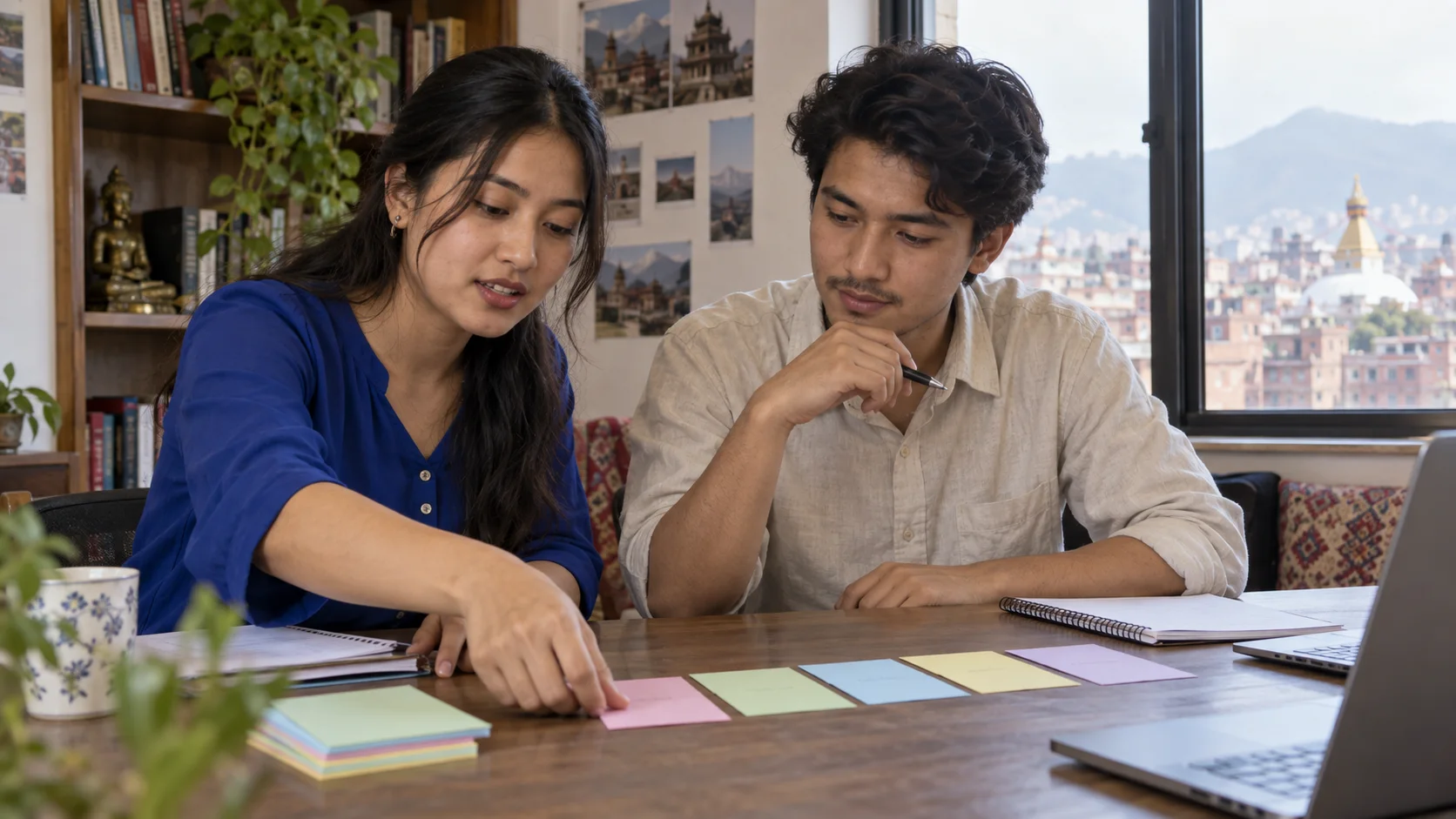 Two students sequence colored cards for claim and evidence in an essay.