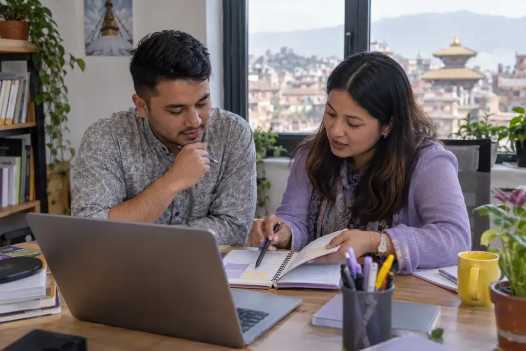 Nepali student and tutor compare an IELTS Band 7.5 preparation plan at a laptop