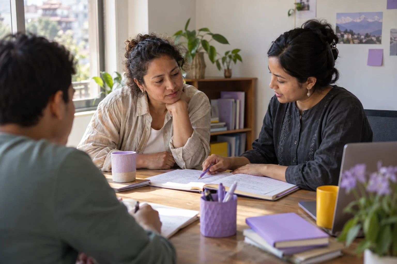 IELTS tutor reviews an opinion essay draft with a student