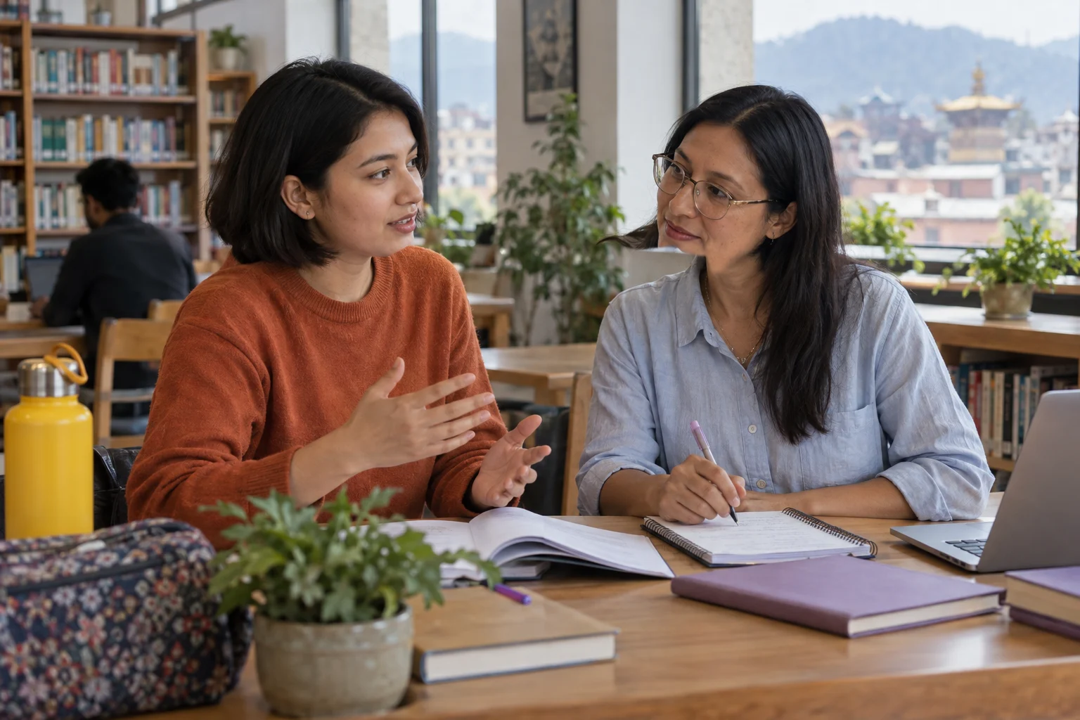 IELTS tutor discusses examples with a Speaking Part 3 student