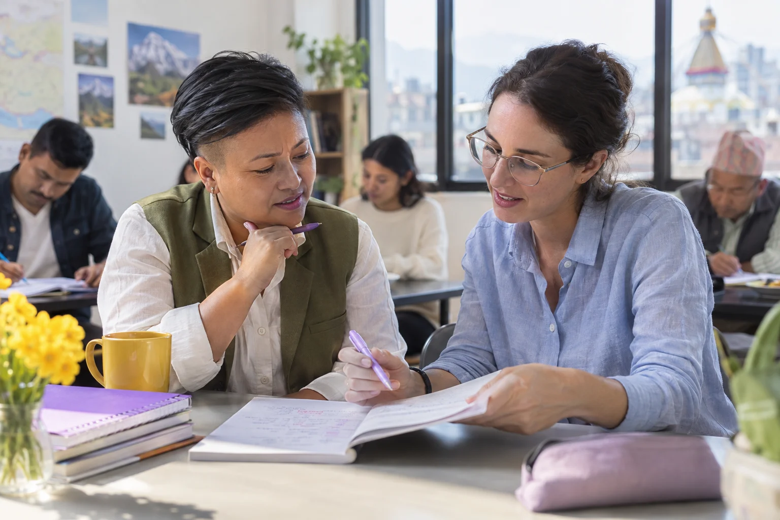 IELTS General Training letter openings and closings study session with a learner and notes