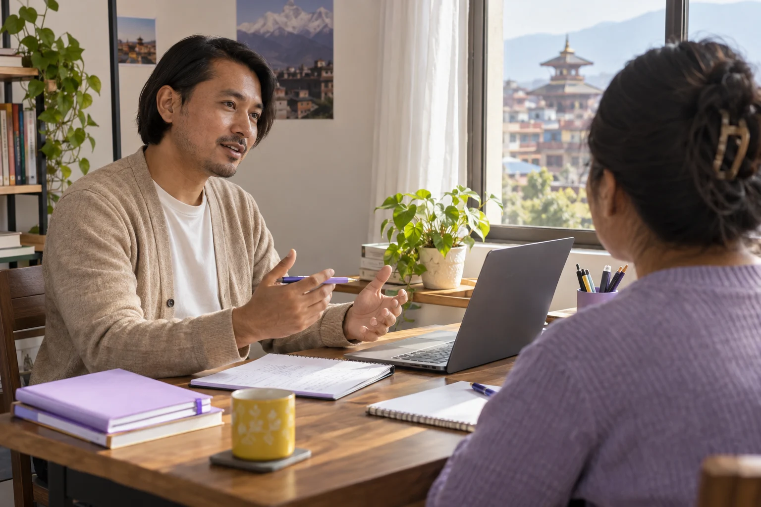 IELTS General Training speaking study session with a learner and notes