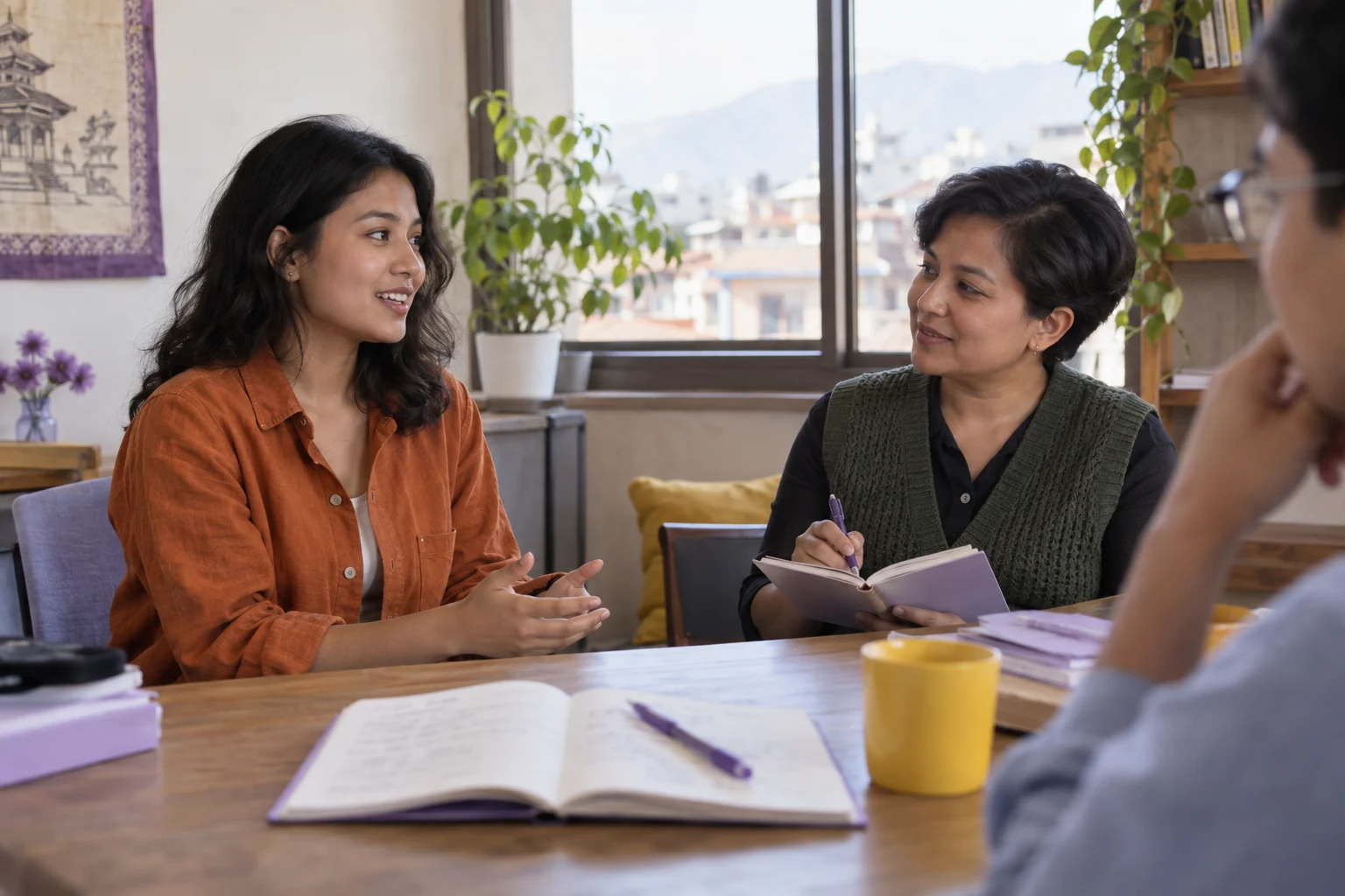 IELTS General Training speaking study session with a learner and notes