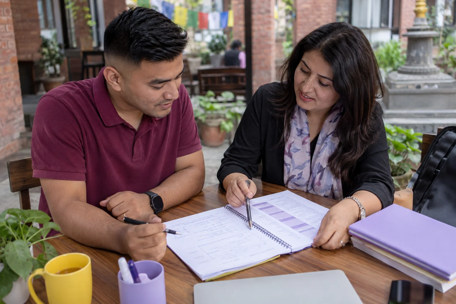 IELTS General Training band target study session with a learner and notes