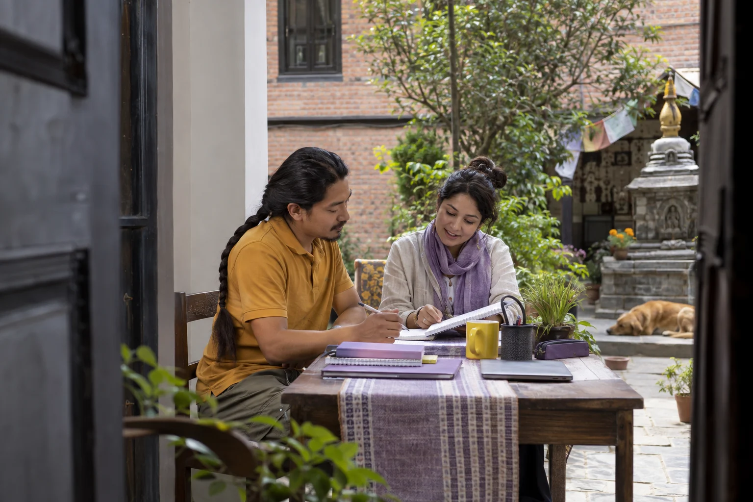 Eight-week IELTS for UKVI Academic study plan — a learner and tutor reviewing study notes