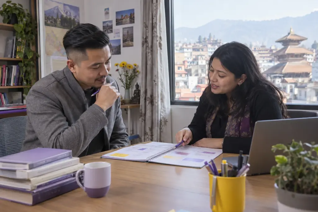 IELTS eight-week UKVI General Training study plan — adult learner and tutor reviewing study notes