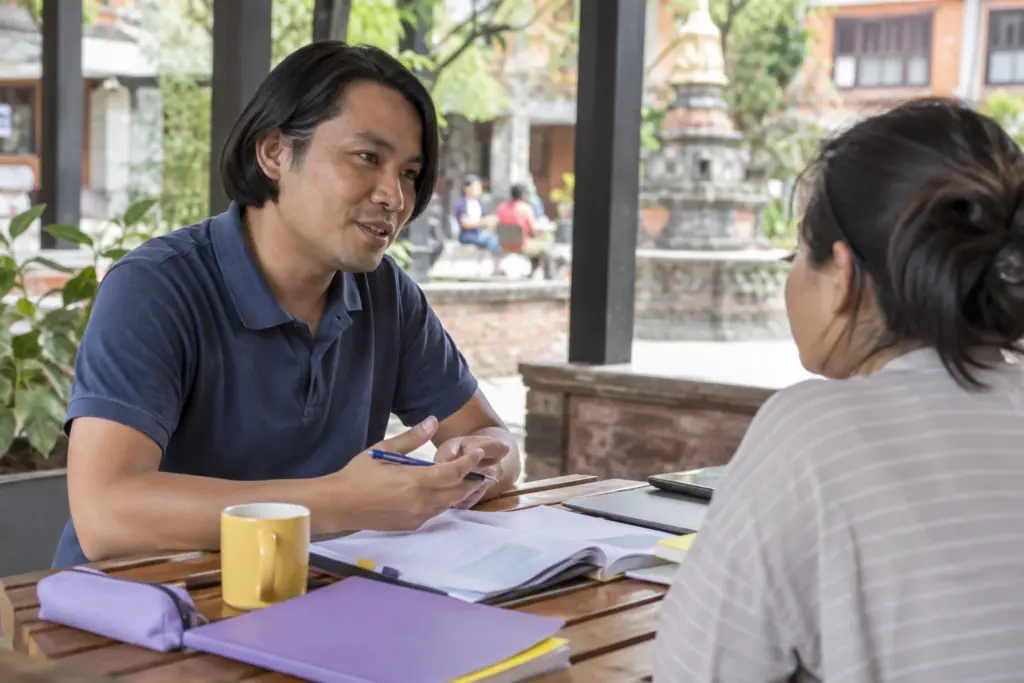 IELTS Life Skills A1 test-day preparation — tutor and learner practising an everyday conversation