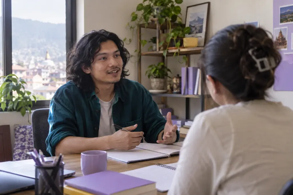 IELTS Life Skills B1 test format — tutor and learner practising an everyday conversation